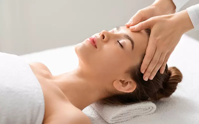 Rejuvenating facial therapy treatment at spa salon clinic